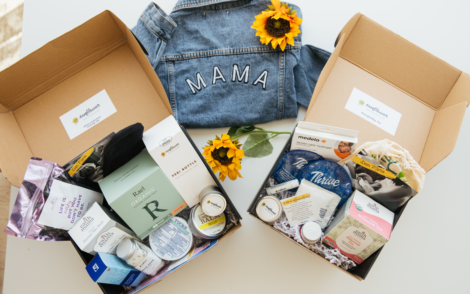 A box containing a sunflower and a denim jacket, representing a combination of nature and fashion.
