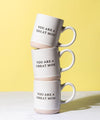 A layer of a " you are a great mom mug"