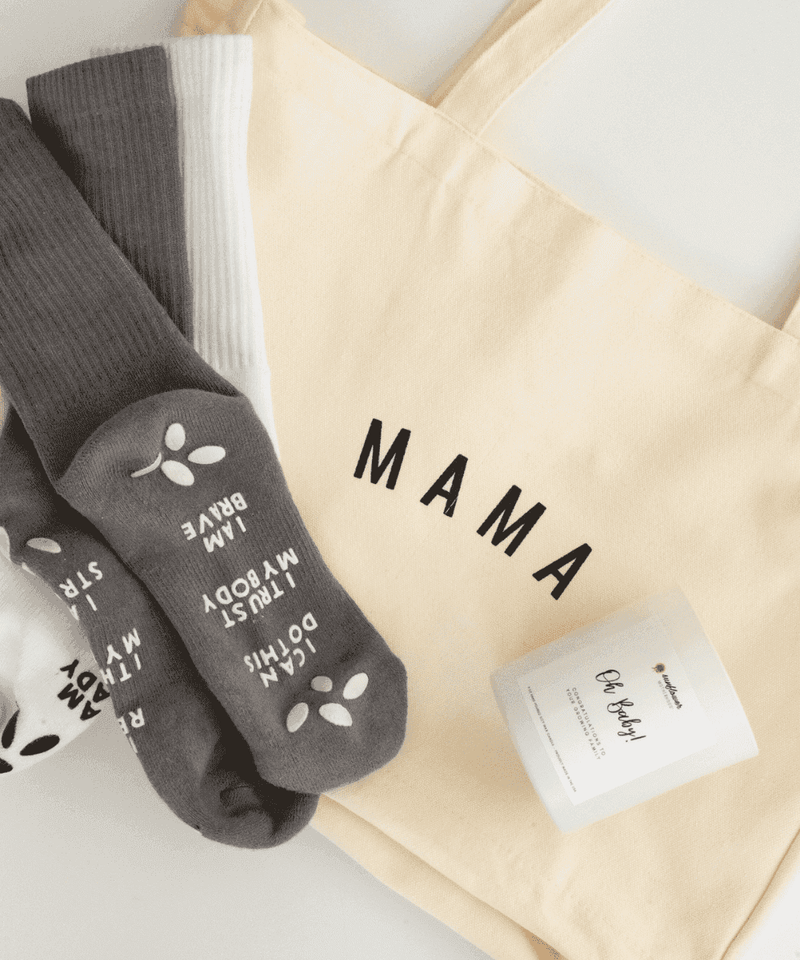 A beautiful gift set for mothers, featuring a variety of pampering items like scented candles, bath salts, and luxurious skincare products.